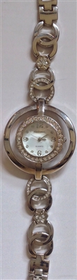 Silver tone circular watch with crystals