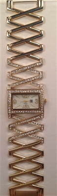 Gold tone watch with crystal embellishment